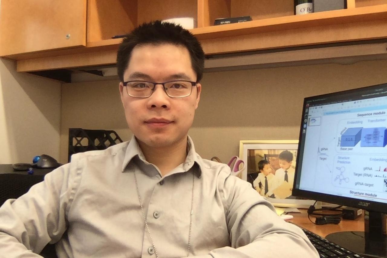 Xuebing Wu, PhD, at desk