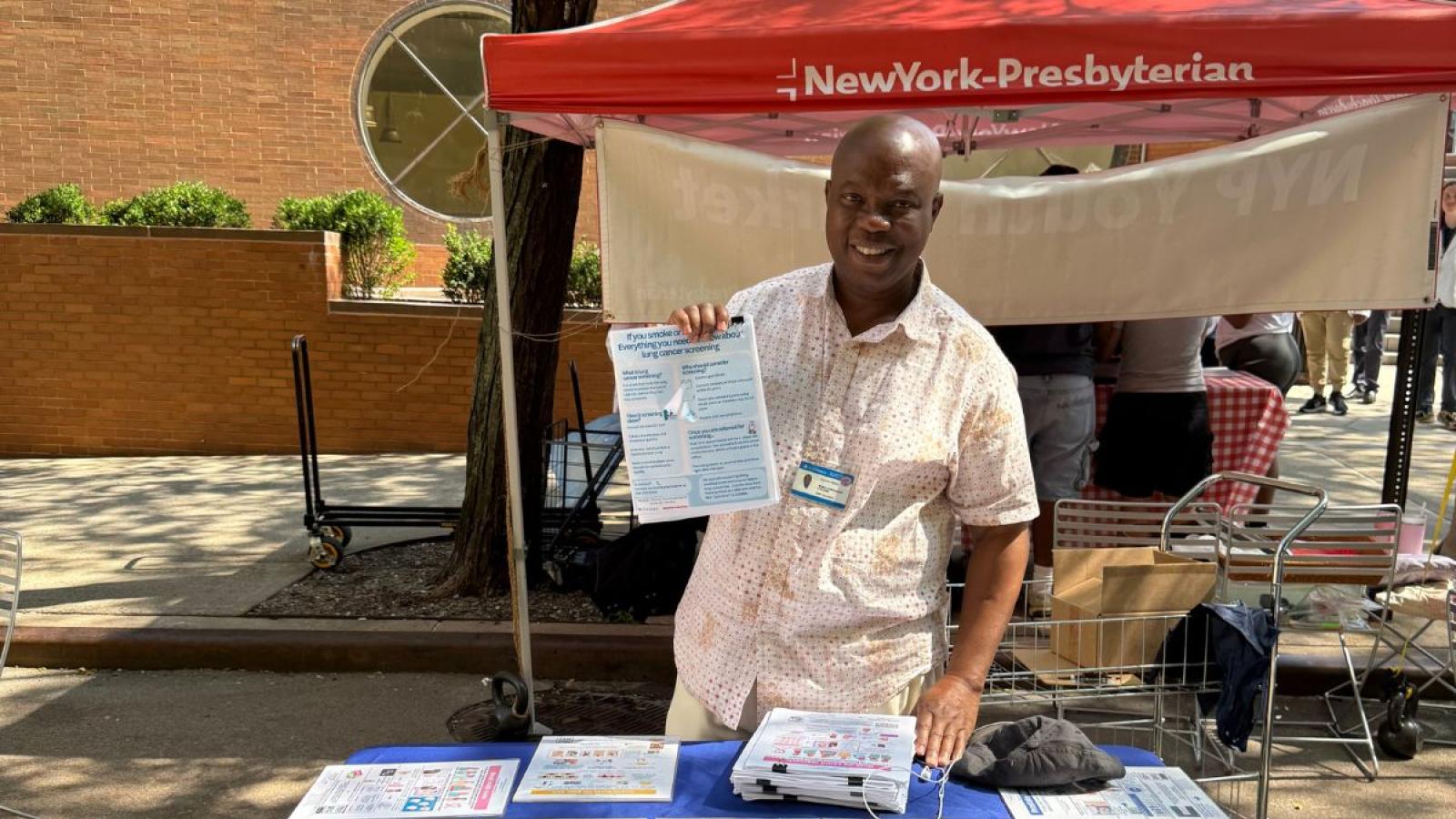 A member of HICCC's COE team at a summer health fair.