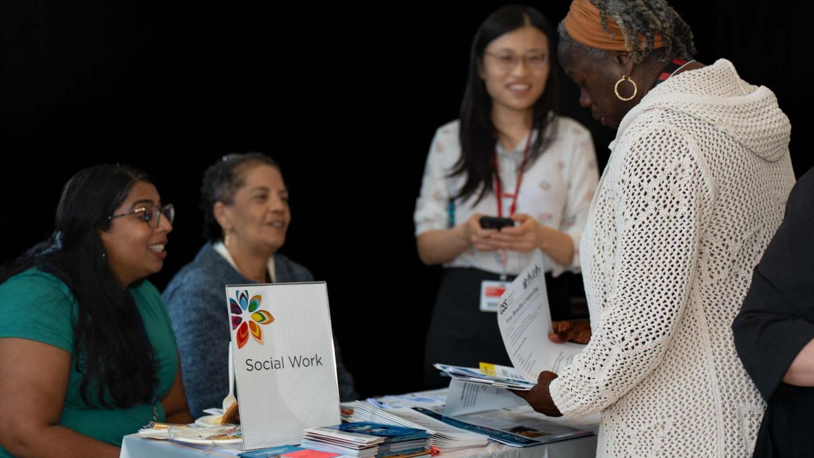 Columbia social work table at Cancer Survivors and Thrivers Day