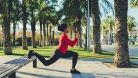 Woman exercises in a park
