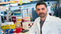 Portrait of Nicholas Arpaia in a lab setting
