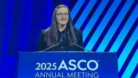 Dawn Hershman stands at the podium titled "2025 ASCO Annual Meeting."