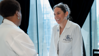 Columbia doctor talking to cancer survivor